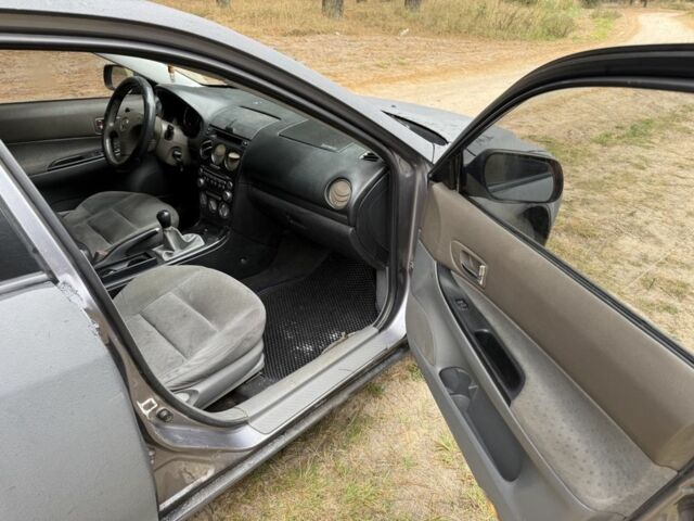 Чорний Мазда 6, об'ємом двигуна 1.8 л та пробігом 245 тис. км за 1750 $, фото 13 на Automoto.ua