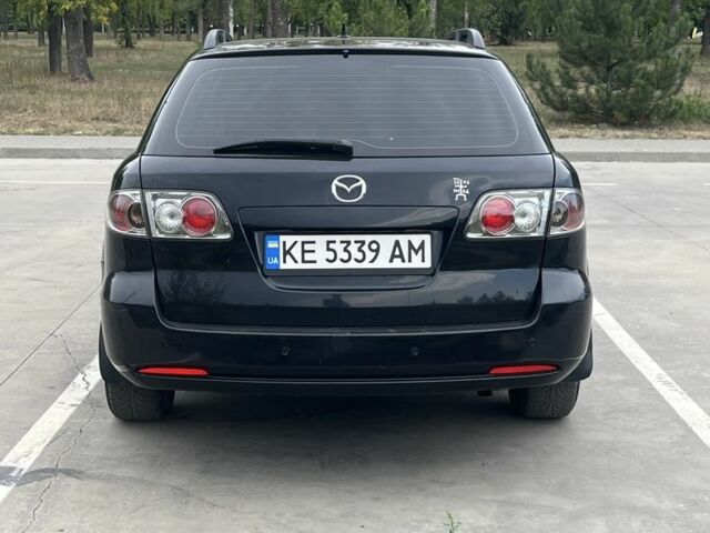Черный Мазда 6, объемом двигателя 2 л и пробегом 360 тыс. км за 4500 $, фото 2 на Automoto.ua