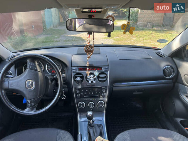 Черный Мазда 6, объемом двигателя 2 л и пробегом 220 тыс. км за 4900 $, фото 16 на Automoto.ua