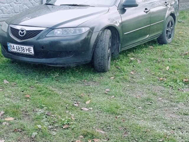 Чорний Мазда 6, об'ємом двигуна 2 л та пробігом 300 тис. км за 2750 $, фото 4 на Automoto.ua