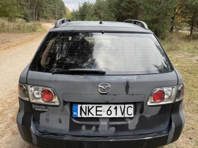 Чорний Мазда 6, об'ємом двигуна 1.8 л та пробігом 245 тис. км за 1750 $, фото 4 на Automoto.ua