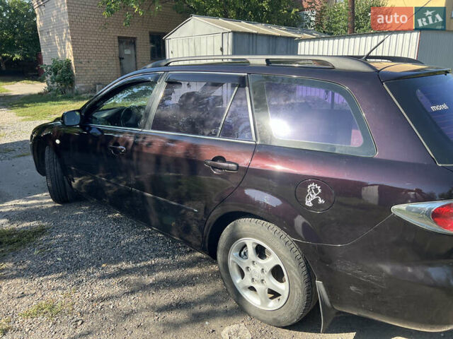 Черный Мазда 6, объемом двигателя 2 л и пробегом 220 тыс. км за 4900 $, фото 5 на Automoto.ua