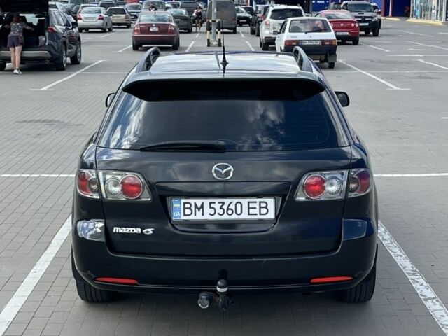 Черный Мазда 6, объемом двигателя 1.8 л и пробегом 303 тыс. км за 4900 $, фото 1 на Automoto.ua
