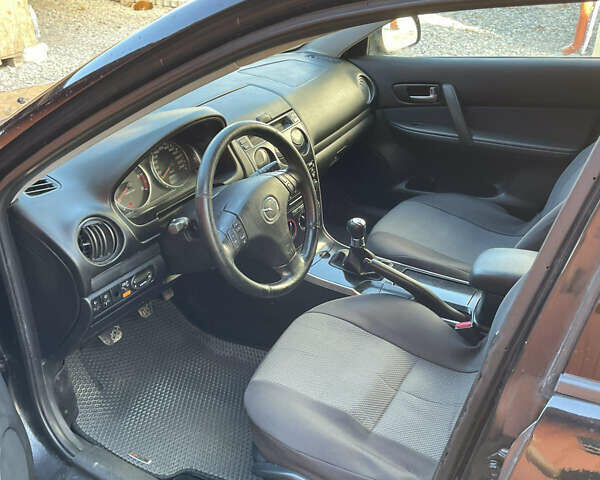 Черный Мазда 6, объемом двигателя 2 л и пробегом 271 тыс. км за 4900 $, фото 7 на Automoto.ua