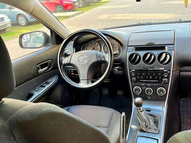 Черный Мазда 6, объемом двигателя 2 л и пробегом 250 тыс. км за 2699 $, фото 1 на Automoto.ua