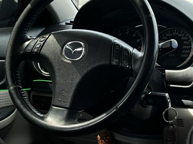 Черный Мазда 6, объемом двигателя 1.8 л и пробегом 303 тыс. км за 4900 $, фото 7 на Automoto.ua