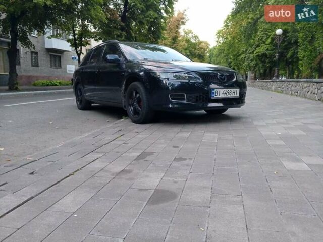 Чорний Мазда 6, об'ємом двигуна 1.8 л та пробігом 204 тис. км за 6000 $, фото 4 на Automoto.ua
