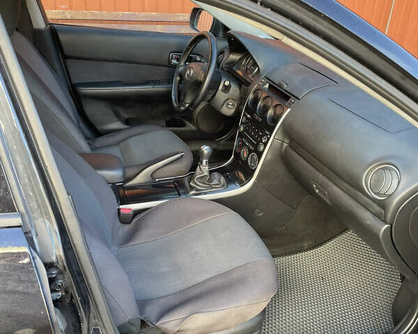 Черный Мазда 6, объемом двигателя 2 л и пробегом 271 тыс. км за 4900 $, фото 10 на Automoto.ua