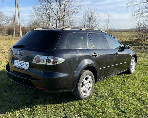 Черный Мазда 6, объемом двигателя 2 л и пробегом 271 тыс. км за 4900 $, фото 16 на Automoto.ua