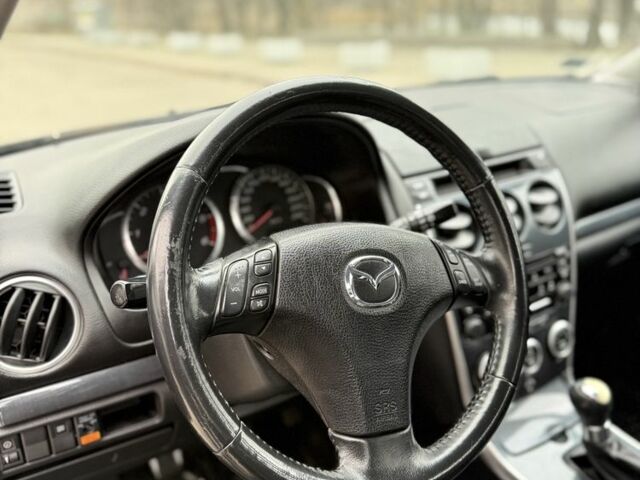 Черный Мазда 6, объемом двигателя 2 л и пробегом 390 тыс. км за 2700 $, фото 4 на Automoto.ua