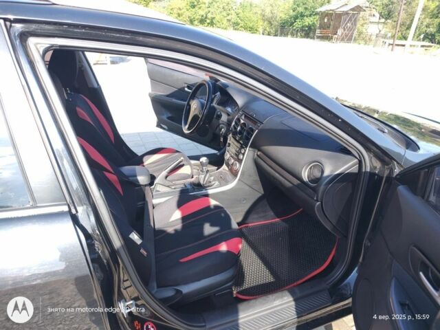 Черный Мазда 6, объемом двигателя 2 л и пробегом 273 тыс. км за 3700 $, фото 1 на Automoto.ua