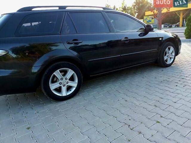 Черный Мазда 6, объемом двигателя 2 л и пробегом 221 тыс. км за 4300 $, фото 5 на Automoto.ua