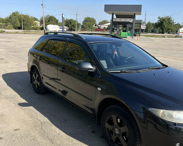 Черный Мазда 6, объемом двигателя 2 л и пробегом 230 тыс. км за 7200 $, фото 17 на Automoto.ua