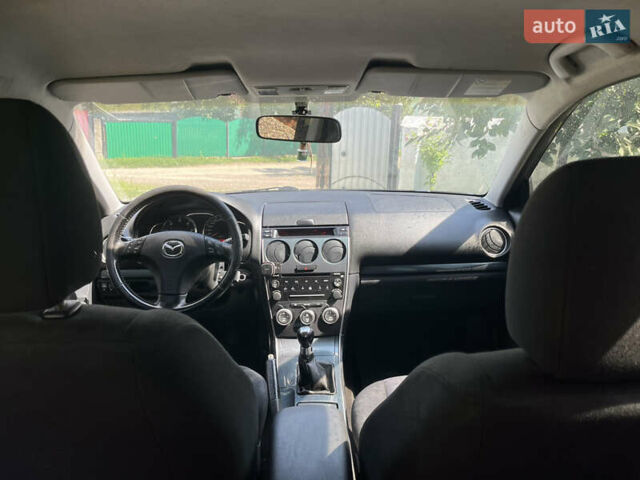 Чорний Мазда 6, об'ємом двигуна 2 л та пробігом 376 тис. км за 4300 $, фото 4 на Automoto.ua