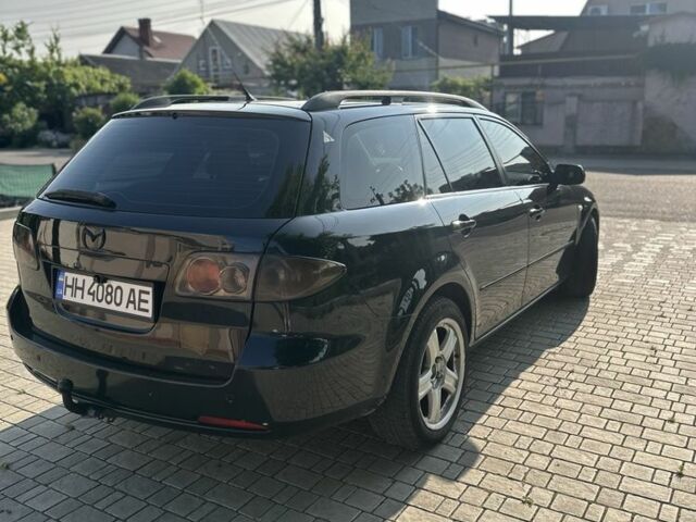 Черный Мазда 6, объемом двигателя 2 л и пробегом 240 тыс. км за 4250 $, фото 2 на Automoto.ua