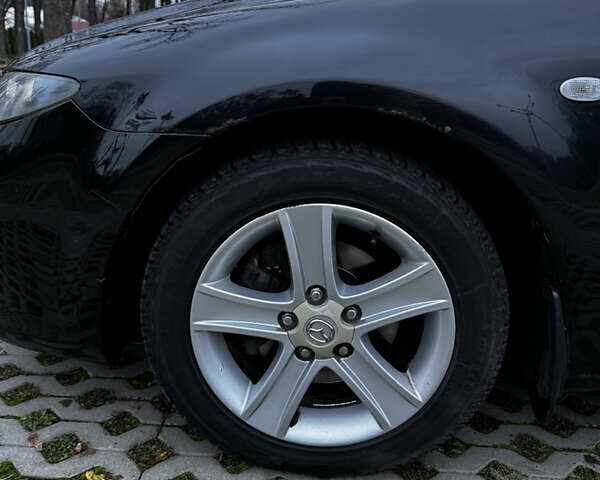 Черный Мазда 6, объемом двигателя 2 л и пробегом 140 тыс. км за 5200 $, фото 5 на Automoto.ua