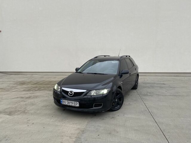 Черный Мазда 6, объемом двигателя 2 л и пробегом 345 тыс. км за 3450 $, фото 1 на Automoto.ua