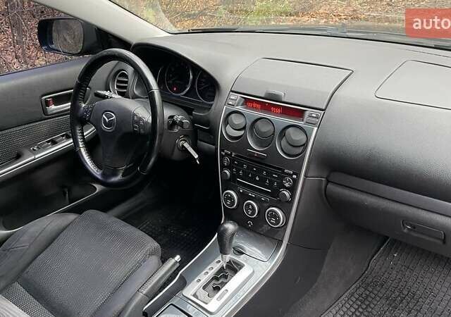 Черный Мазда 6, объемом двигателя 2.3 л и пробегом 293 тыс. км за 5300 $, фото 13 на Automoto.ua