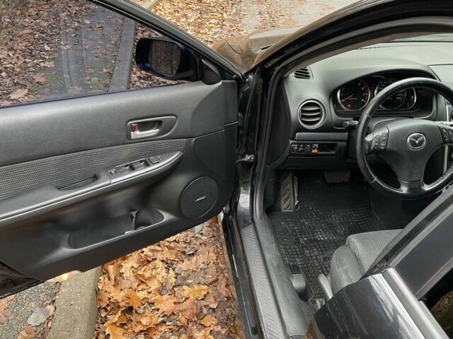 Черный Мазда 6, объемом двигателя 2.3 л и пробегом 293 тыс. км за 5300 $, фото 13 на Automoto.ua