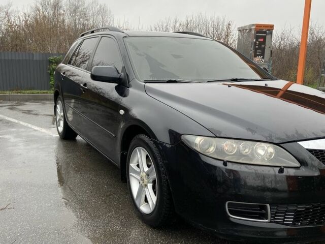 Черный Мазда 6, объемом двигателя 2 л и пробегом 140 тыс. км за 5700 $, фото 2 на Automoto.ua