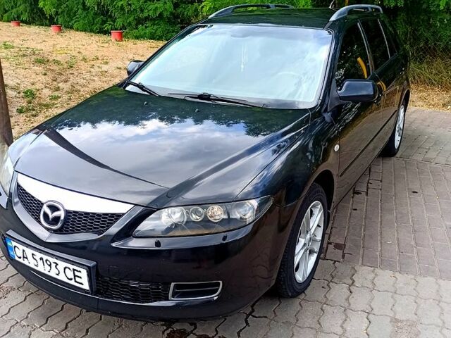 Черный Мазда 6, объемом двигателя 2 л и пробегом 325 тыс. км за 5800 $, фото 2 на Automoto.ua