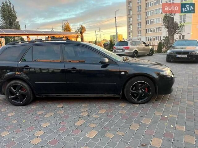 Черный Мазда 6, объемом двигателя 2 л и пробегом 344 тыс. км за 2900 $, фото 1 на Automoto.ua