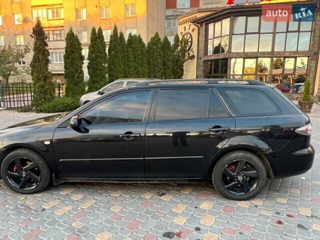 Черный Мазда 6, объемом двигателя 2 л и пробегом 344 тыс. км за 2900 $, фото 2 на Automoto.ua
