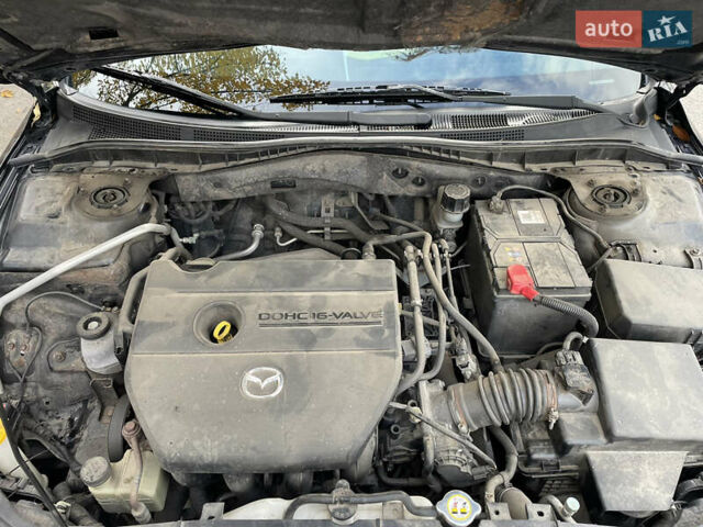 Черный Мазда 6, объемом двигателя 1.8 л и пробегом 251 тыс. км за 6200 $, фото 29 на Automoto.ua