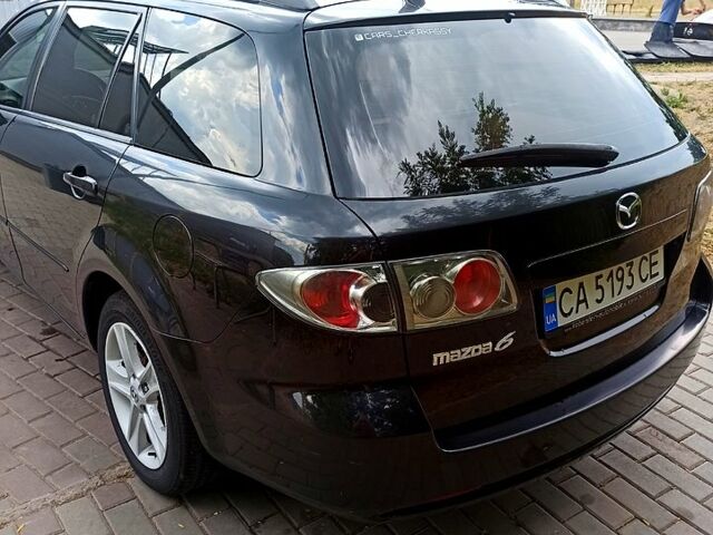 Черный Мазда 6, объемом двигателя 2 л и пробегом 325 тыс. км за 5800 $, фото 4 на Automoto.ua