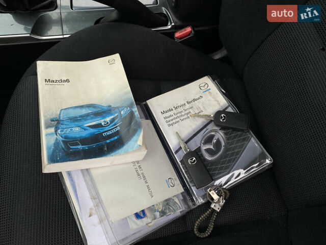 Чорний Мазда 6, об'ємом двигуна 2 л та пробігом 345 тис. км за 3450 $, фото 18 на Automoto.ua