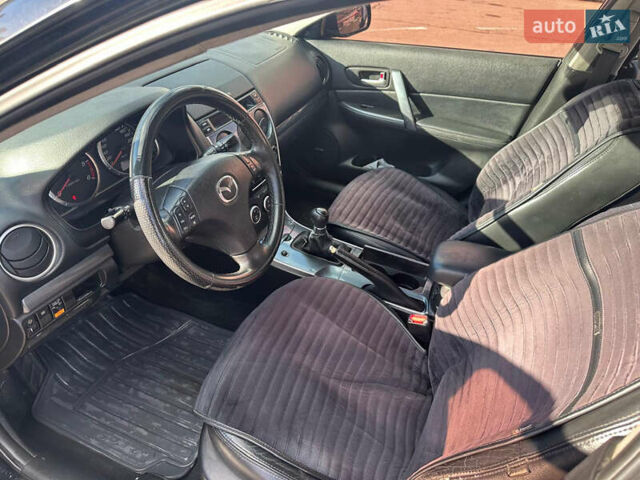 Черный Мазда 6, объемом двигателя 2 л и пробегом 342 тыс. км за 4500 $, фото 6 на Automoto.ua