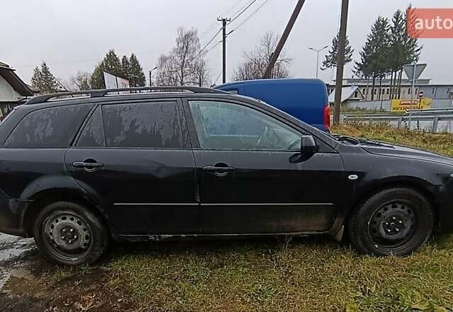 Чорний Мазда 6, об'ємом двигуна 2 л та пробігом 445 тис. км за 2400 $, фото 7 на Automoto.ua