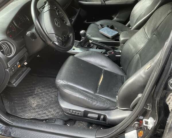 Черный Мазда 6, объемом двигателя 2 л и пробегом 305 тыс. км за 3500 $, фото 9 на Automoto.ua