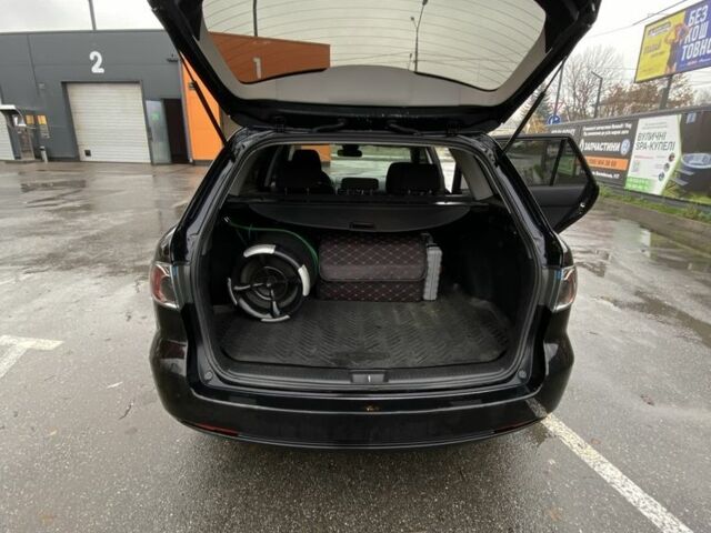 Черный Мазда 6, объемом двигателя 2 л и пробегом 140 тыс. км за 5700 $, фото 5 на Automoto.ua