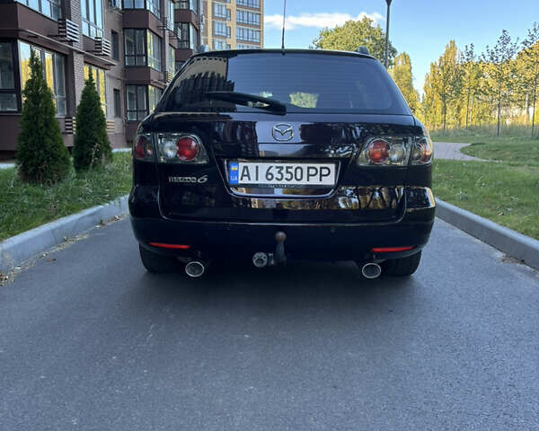 Черный Мазда 6, объемом двигателя 2.3 л и пробегом 201 тыс. км за 5600 $, фото 6 на Automoto.ua