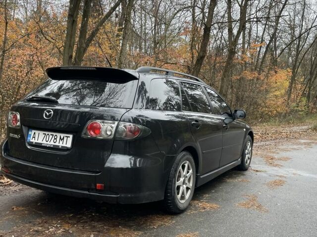 Черный Мазда 6, объемом двигателя 2.3 л и пробегом 293 тыс. км за 5300 $, фото 2 на Automoto.ua