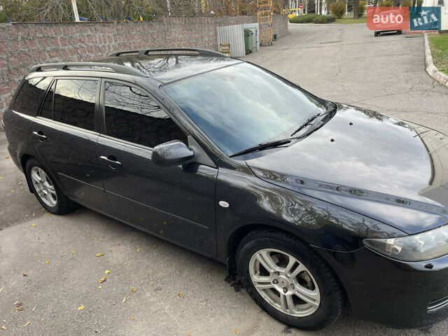 Черный Мазда 6, объемом двигателя 1.8 л и пробегом 251 тыс. км за 6200 $, фото 6 на Automoto.ua