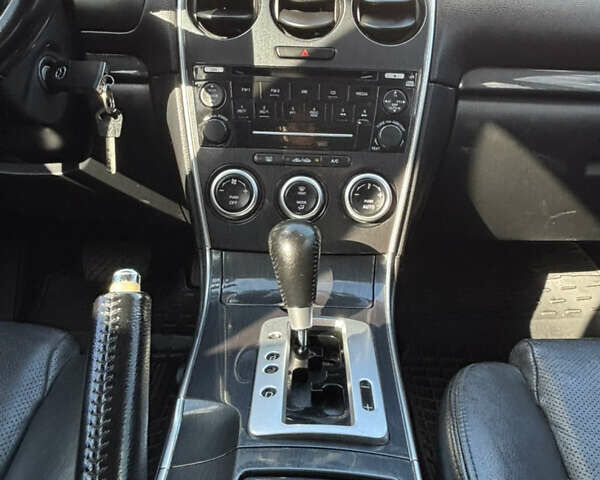 Черный Мазда 6, объемом двигателя 2.3 л и пробегом 202 тыс. км за 5250 $, фото 19 на Automoto.ua