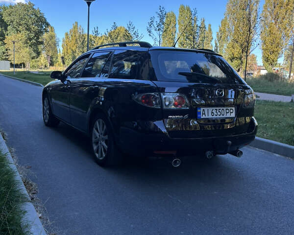 Черный Мазда 6, объемом двигателя 2.3 л и пробегом 201 тыс. км за 5600 $, фото 4 на Automoto.ua