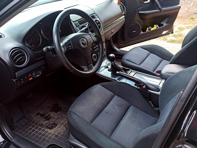 Черный Мазда 6, объемом двигателя 2 л и пробегом 325 тыс. км за 5800 $, фото 6 на Automoto.ua
