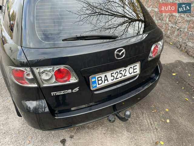 Черный Мазда 6, объемом двигателя 1.8 л и пробегом 251 тыс. км за 6200 $, фото 3 на Automoto.ua