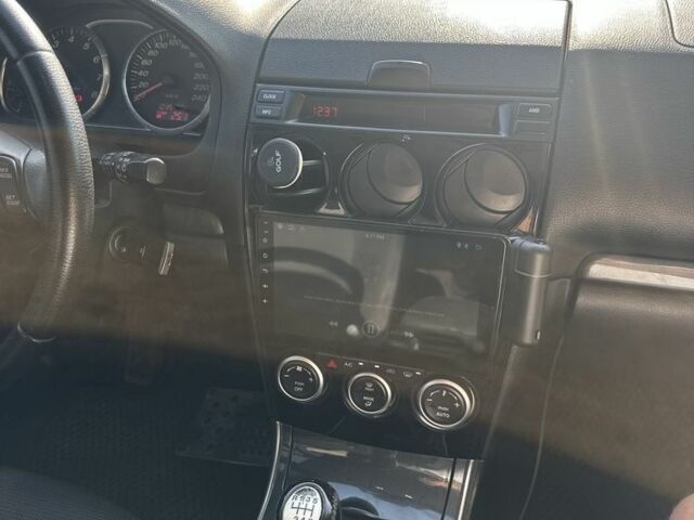 Черный Мазда 6, объемом двигателя 2 л и пробегом 240 тыс. км за 4250 $, фото 6 на Automoto.ua