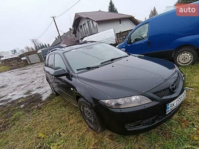 Чорний Мазда 6, об'ємом двигуна 2 л та пробігом 445 тис. км за 2400 $, фото 2 на Automoto.ua
