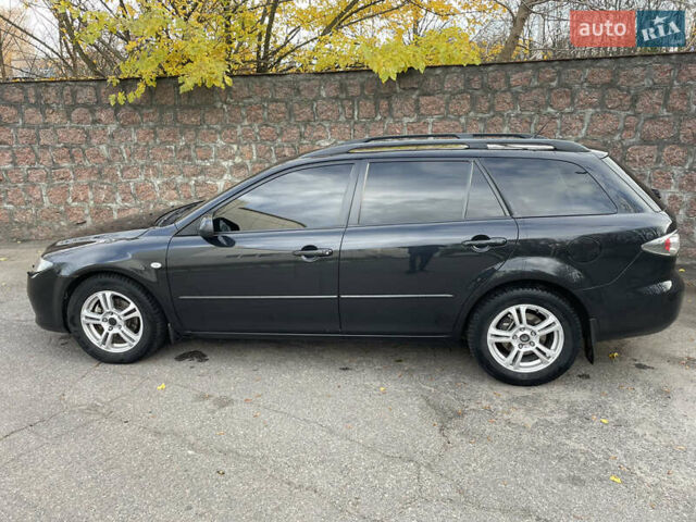 Черный Мазда 6, объемом двигателя 1.8 л и пробегом 251 тыс. км за 6200 $, фото 5 на Automoto.ua