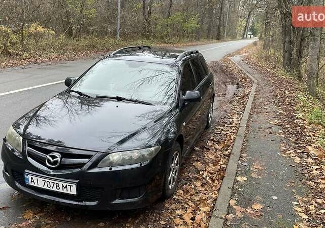 Черный Мазда 6, объемом двигателя 2.3 л и пробегом 293 тыс. км за 5300 $, фото 3 на Automoto.ua