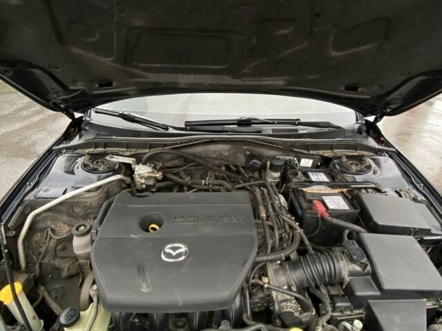 Черный Мазда 6, объемом двигателя 2 л и пробегом 140 тыс. км за 5700 $, фото 11 на Automoto.ua