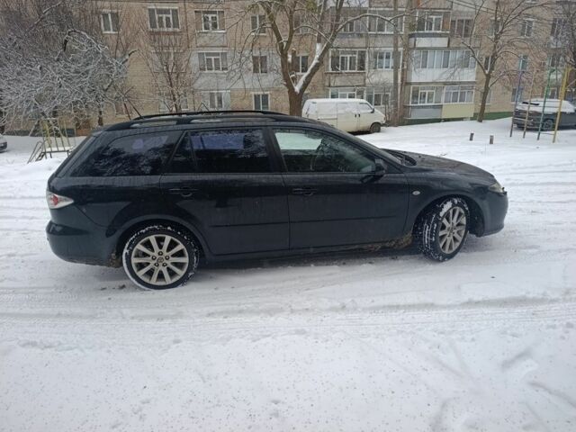 Черный Мазда 6, объемом двигателя 2.3 л и пробегом 350 тыс. км за 2500 $, фото 1 на Automoto.ua
