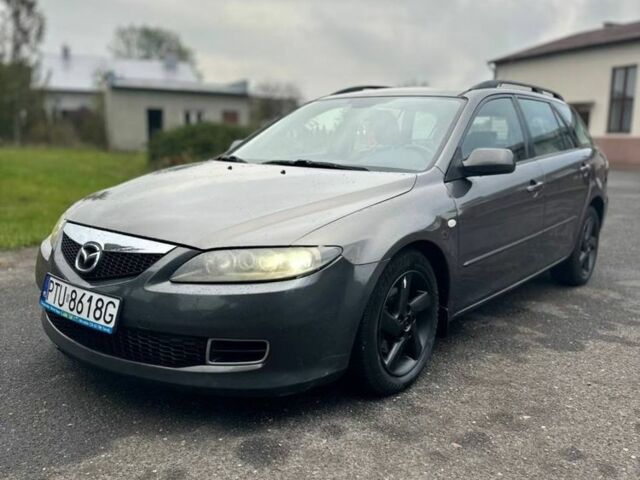 Черный Мазда 6, объемом двигателя 2 л и пробегом 230 тыс. км за 2656 $, фото 1 на Automoto.ua