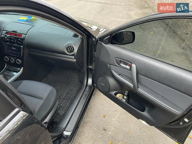 Черный Мазда 6, объемом двигателя 1.8 л и пробегом 251 тыс. км за 6200 $, фото 19 на Automoto.ua