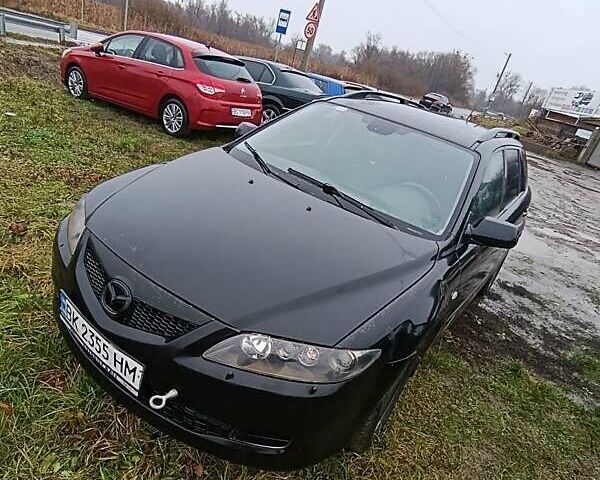 Чорний Мазда 6, об'ємом двигуна 2 л та пробігом 445 тис. км за 2400 $, фото 3 на Automoto.ua